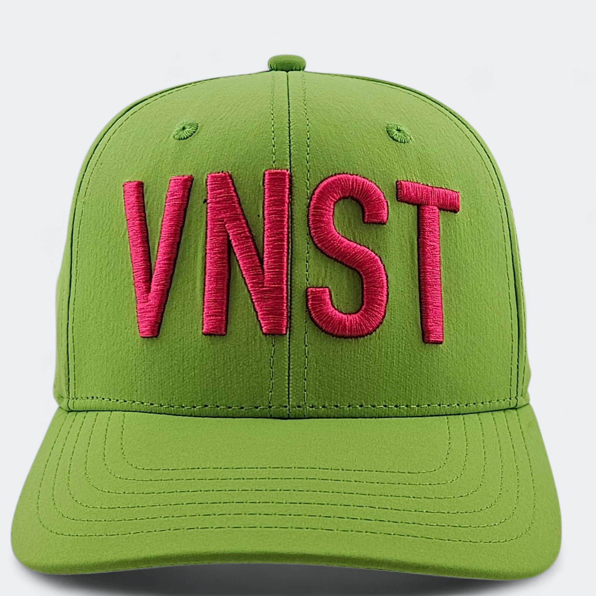 Green cap with pink 'VNST' block letters on a light gray background