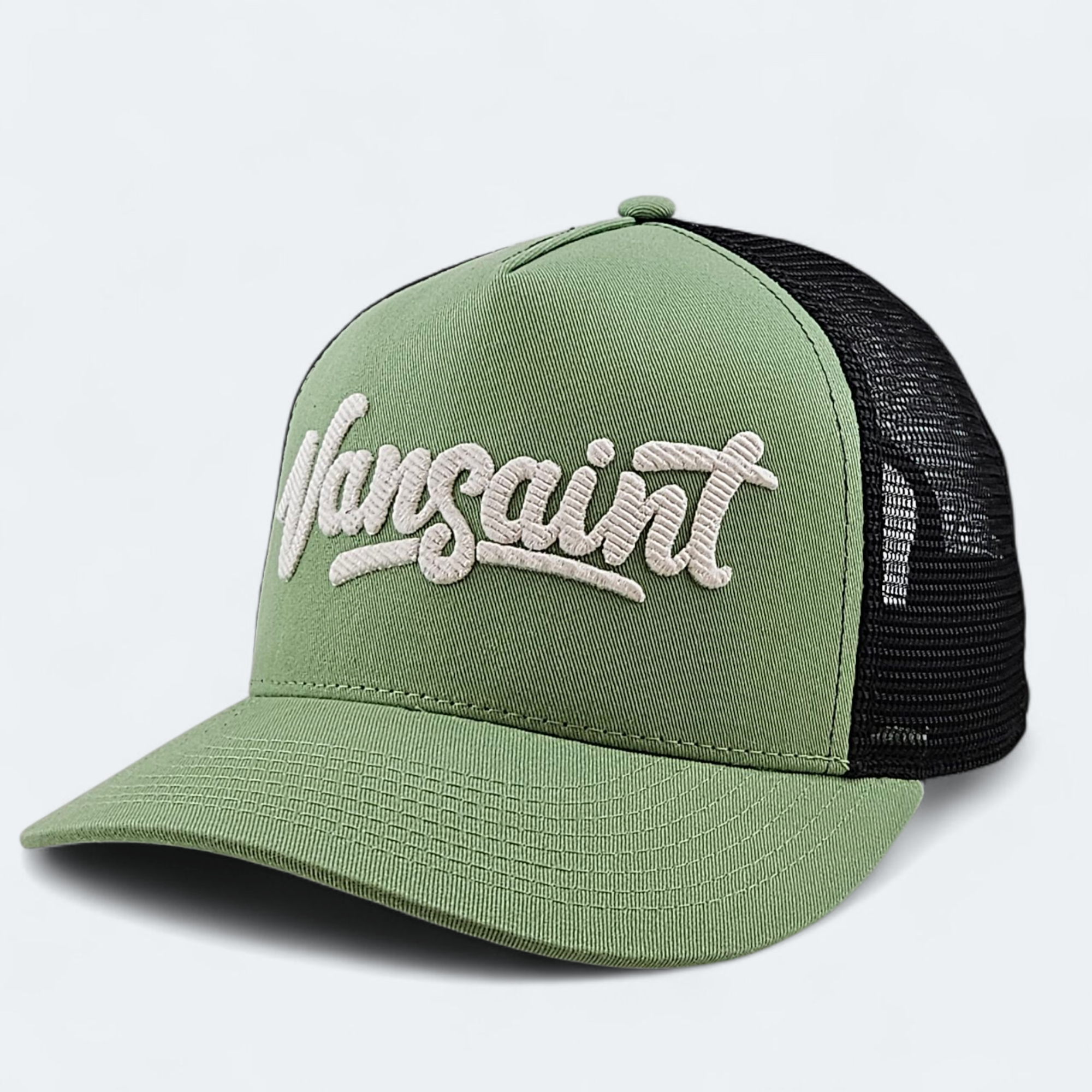 Green and black trucker cap with 'Vansaint' logo on a white background