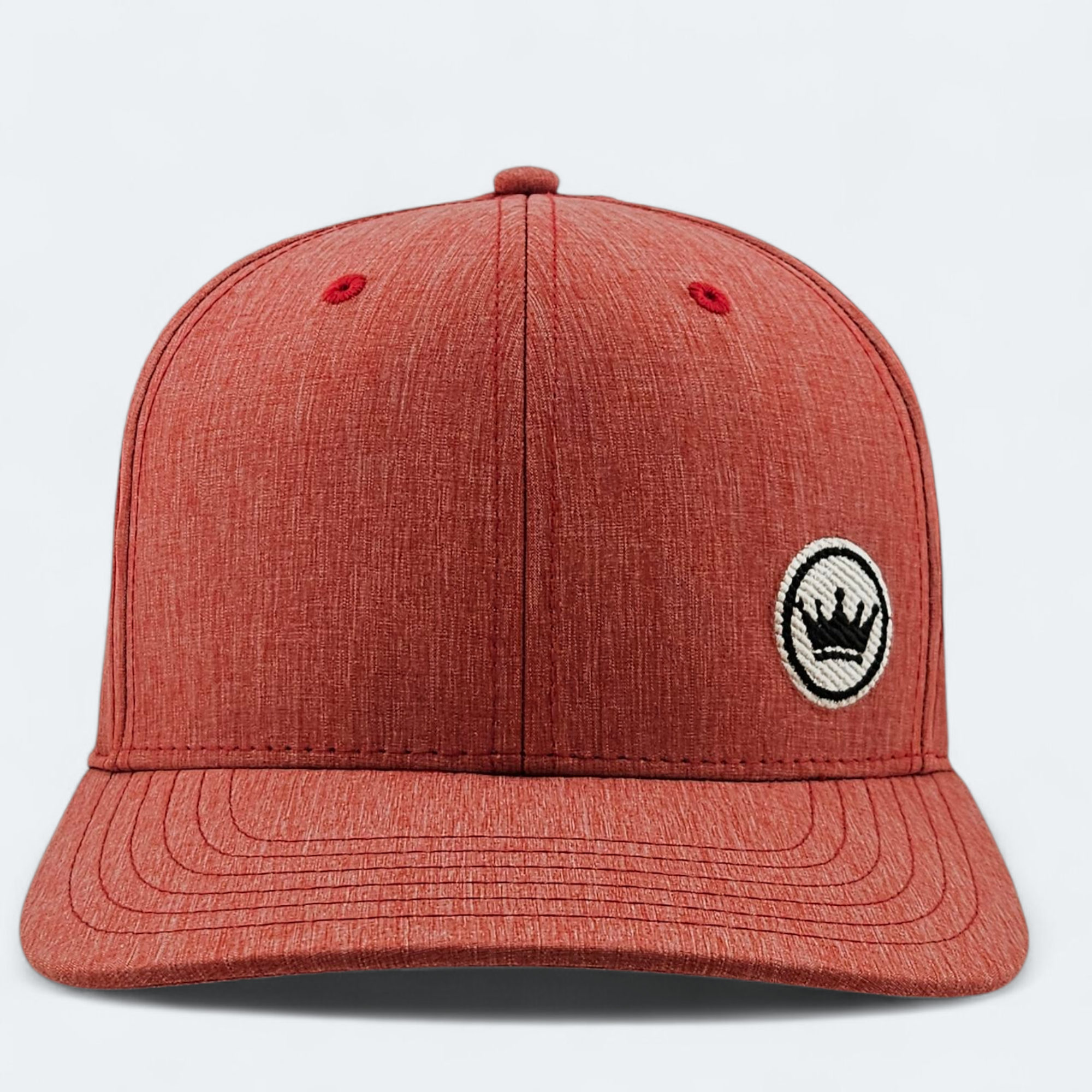 Red cap with a logo on a light gray background